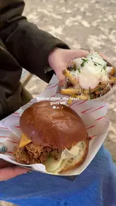 A montage of street food dishes and the atmosphere at a Street Food Circus event, featuring loaded fries, a burger, churros, and cocktails in an outdoor setting.