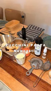 A promotional reel for a tiramisu-making class at Zucchini Pasta Bar, featuring the preparation process and a look at the restaurant's menu and food offerings.