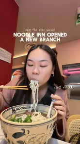 A creator visits the newly opened Noodle Inn branch in Covent Garden, highlighting the lack of queues compared to the Soho location, the modern interior, and several menu items including okra salad, prawn toast, a shredded duck burger, and beef short rib noodle soup.