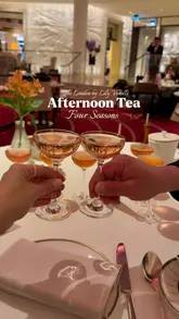 A visually appealing montage showcasing the 'London by Lily Vanilli' afternoon tea at the Four Seasons Hotel at Tower Bridge. The video features shots of the hotel's grand exterior, elegant interior, and close-ups of the afternoon tea spread, including cakes, pastries, and cocktails.