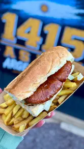 A short, punchy review of 1415 Asado's residency at Herbert's Yard, focusing on their Argentine-style BBQ subs. The video features close-up shots of the meat being sliced and assembled, highlighting the juicy texture and fresh ingredients, followed by a recommendation of the beef and sausage options.