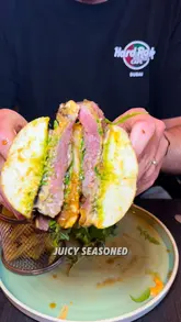 A creator visits the pre-launch of Wonderlust Bistro in Oldham, providing a review of the venue's atmosphere and several menu items, including a steak sandwich, mozzarella sticks, a chicken burger, and a pistachio and kunafa French toast.