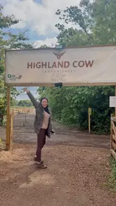 A travel vlog showcasing a stay at a Highland cow-themed farm retreat in Kent, followed by a visit to a nearby Highland cow experience and cafe where the creator enjoys afternoon tea.
