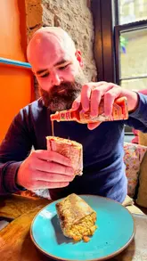 A vlog-style review of the Patron Sunday Brunch menu at The Basement in Edinburgh, featuring cocktails and Mexican-inspired breakfast dishes.