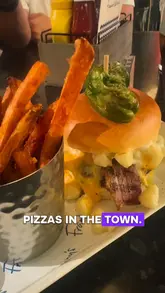 A creator visits Frankie & Benny's to review their limited-time £5 menu deal, showcasing the interior and several dishes including a chicken burger, meat medley pizza, and a mac daddy burger with sweet potato fries.