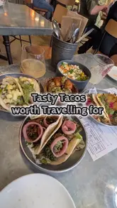 A montage of various tacos, sides, and cocktails at a Mexican restaurant, showcasing the menu items and the interior.