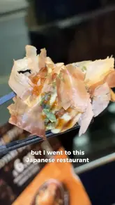 Two creators visit a Japanese restaurant in central London, reviewing takoyaki, karaage bao buns, and shoyu ramen. The video features a fast-paced, vlog-style edit with direct-to-camera commentary and close-up shots of the food.