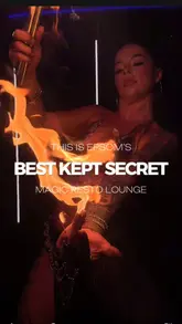 A high-energy, influencer-style vlog showcasing a visit to Magic Resto Lounge in Epsom. The video highlights the venue's luxurious, Instagrammable interiors, shisha service, and a wide variety of food and drink options, including mocktails, pasta, burgers, and grilled meats.