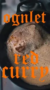 A home cooking tutorial demonstrating how to prepare an onglet steak with a Thai red curry sauce. The creator uses a mortar and pestle to make the curry paste and sears the steak in a cast-iron pan, highlighting the quality of the meat from a local butcher.