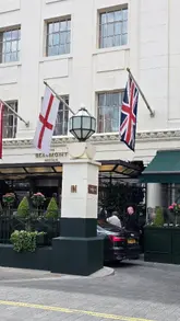 A video tour of a luxury hotel suite at The Beaumont in Mayfair, showcasing the bedroom, living area, bathroom, and walk-in wardrobe.