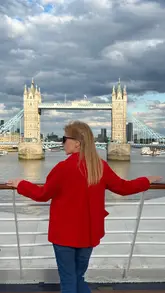 A travel vlog documenting a short cruise trip from London to France via Windstar Cruises, highlighting the convenience of a central London departure, the onboard experience including dining and entertainment, and a visit to Mont-Saint-Michel.