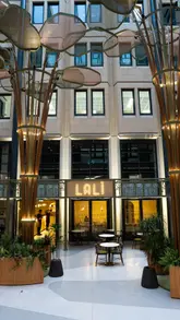 A short, aesthetic montage showcasing the interior and menu items of Lali Cafe in Covent Garden, focusing on the calm, upscale atmosphere and beautifully presented food and drinks.
