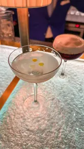 A review of the Donovan Bar at Brown's Hotel, focusing on their signature Marimo Martini. The creator provides a critique of the drink's flavor profile and the venue's atmosphere.