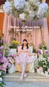A montage of various floral art installations across Chelsea, London, themed around space and fantasy for the Chelsea in Bloom event. The creator poses in front of several displays, showcasing the creative floral designs.