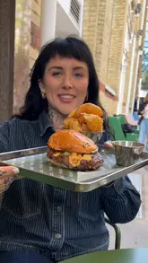 A review of Heard. Burger in Soho, featuring close-ups of their burgers, sides, and drinks, along with the creator's reaction to the food.