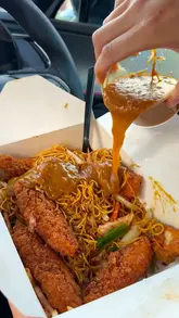 A food review video where the creator visits a Chinese takeaway called Summer Inn and samples several dishes, including a '4-in-1' with beef and curry sauce, a '4-in-1' with dry chicken, black bean sauce, and curry sauce, salt and chilli chicken balls, and a noodle box with satay sauce. The review takes place in the creator's car.