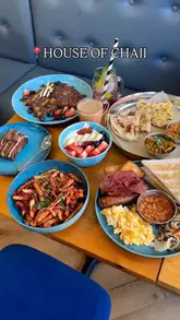 A showcase of a new breakfast spot in Erdington, featuring a variety of dishes including a Desi breakfast, English breakfast, French toast, masala fries, and various drinks.