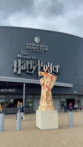 A montage of various iconic sets and props from the Warner Bros. Studio Tour London, including the Great Hall, Diagon Alley, and various magical artifacts.