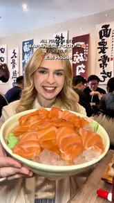 A short, fast-paced reel featuring a creator showcasing various Japanese dishes at an all-you-can-eat restaurant. The video highlights the variety of food available, including sushi, sashimi, tempura, and takoyaki, while emphasizing the affordable price point.