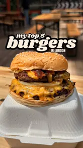 A food review video featuring a creator evaluating a double cheeseburger from Bleecker Burger in London. The video includes close-up shots of the burger being cooked and assembled, followed by the creator's tasting and commentary.