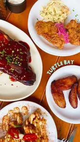 A family visits Turtle Bay for lunch, highlighting the kid-friendly environment, the variety of Caribbean dishes, and the overall dining experience.