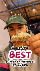 A review of the Secret Slider Club burger omakase pop-up at Mercato Metropolitano, showcasing the preparation of various unique slider courses and the creator's tasting experience.