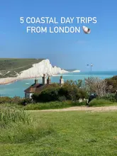 A high-quality, bright landscape photograph of the Seven Sisters Cliffs, used as a cover image for a listicle-style social media post recommending coastal day trips from London.