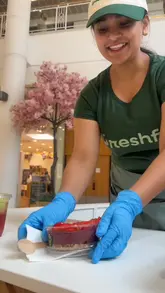 The creator visits FreshFix in CastleCourt, Belfast, to review their new acai bowls and fresh juices. The video features a walk-through of the location, a look at the menu, a demonstration of the preparation process, and the creator's reaction to the food and drink.