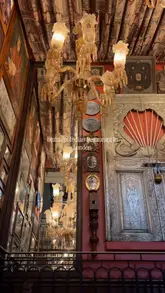 A cinematic montage showcasing the interior and food offerings of Colonel Saab, an Indian restaurant in London. The video features slow, deliberate pans of the ornate decor followed by close-ups of various dishes and drinks served during their Sunday brunch service.