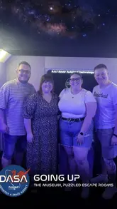 A couple visits Puzzled Escape Rooms to try out their space-themed room. The video follows them as they solve puzzles, interact with the set, and ultimately escape, highlighting the immersive design and fun atmosphere of the activity.