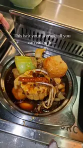 A video showcasing the Korean BBQ and hotpot experience at Daiu in Cardiff Bay, highlighting the interactive nature of the meal, the buffet selection, and the sauce station.