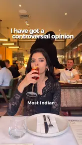 The creator visits Pahli Hill Bandra Bhai in Central London, providing a review of their experience. The video features a mix of talking-head segments, close-ups of various Indian dishes like lamb chops, dosa, and crab sukkha, and shots of the restaurant's interior. The creator offers specific recommendations and critiques, maintaining a conversational and informative tone throughout.