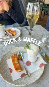 A high-quality showcase of an afternoon tea experience at a high-rise restaurant, featuring close-ups of savoury and sweet items, champagne, and panoramic city views.