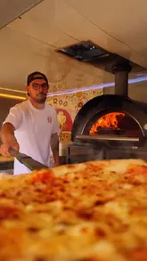 A fast-paced recap of a food festival featuring a wide variety of street food vendors, cocktail bars, and family-friendly activities. The video highlights the diverse culinary options, including pizza, grilled meats, paella, and Indian street food, alongside a lively outdoor atmosphere.