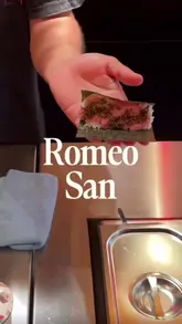 A fast-paced, engaging review of Romeo San, a temaki bar in London. The video showcases the preparation of various hand rolls, including premium ingredients like Wagyu, foie gras, and caviar, while highlighting the intimate counter-seating experience.