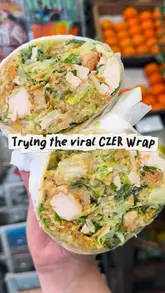 A short, fast-paced review of a wrap shop called CZER, showing the preparation process and the final product.