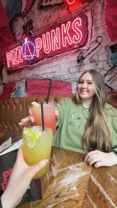 A short, upbeat reel featuring a visit to Pizza Punks, highlighting the menu, cocktails, and the experience of sharing a meal with a friend.