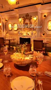 A polished venue tour of Lilibet's in Mayfair, highlighting its historic connection to Queen Elizabeth II, elegant interior, and high-end Sunday lunch offerings including a seafood platter and flaming dessert.
