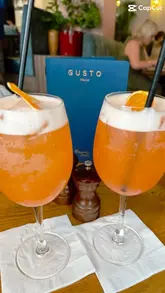 The video is a fast-paced montage promoting Nottingham Cocktail Week, featuring a creator visiting various bars and restaurants to sample signature cocktails. It highlights the diversity of the local hospitality scene through quick cuts of drinks and venue interiors, set to music with text overlays explaining the event.