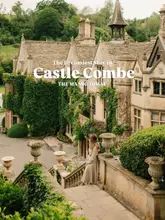 A beautifully composed, atmospheric shot of a person standing on stone steps overlooking a historic manor house in Castle Combe. The image uses natural, soft lighting and a classic architectural perspective to evoke a sense of luxury, heritage, and escapism.