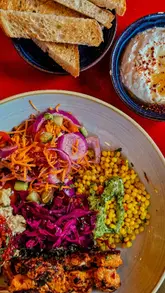 A short, punchy montage showcasing the interior, exterior, and food/drink menu of Edmundo Lounge in Bury St Edmunds. The video features quick cuts between cocktails, a smash burger, and mezze dishes, highlighting the venue's relaxed atmosphere.