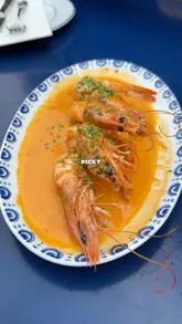 A review of Bar Douro, featuring a variety of Portuguese small plates, cocktails, and the outdoor dining experience with a view of the Shard.