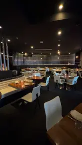 A promotional reel for STK The Strand, featuring a montage of the restaurant's interior, cocktails, and various dishes including steak and sliders. The video highlights the venue's lively, nightlife-oriented atmosphere.