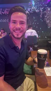 A montage-style reel showcasing a bottomless brunch experience at Shamrock Social, featuring clips of the DJ, dancing, various cocktails, pints of Guinness, and food items like burgers and pretzel bites.