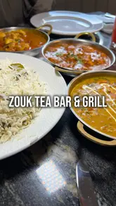 A promotional video showcasing the new summer menu at Zouk Tea Bar & Grill, featuring a variety of curries, kebabs, and summer-themed cocktails, along with shots of the restaurant's interior and outdoor seating area.