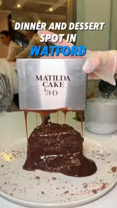 Two creators visit the Haute Dolci branch in Watford to review their evening menu, featuring burgers, fries, a vanilla caramel milkshake, a chocolate shot, and a signature Matilda chocolate cake.