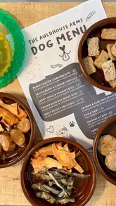 A promotional reel for The Auldhouse Arms showcasing their dog-friendly brunch event, featuring shots of dogs, a dedicated dog menu, and human breakfast dishes.
