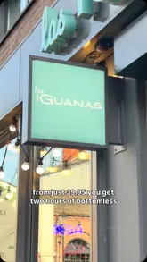 A short video showcasing a bottomless brunch experience at Las Iguanas, featuring a variety of cocktails, beers, and food items like burritos, burgers, and mac and cheese.