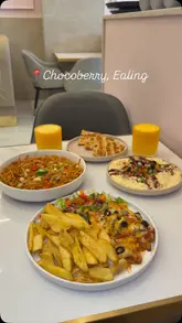 A montage of food and drink items served at Chocoberry in Ealing, interspersed with shots of the cafe's interior.