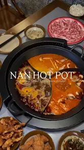 A review of Nan Hot Pot in London's Chinatown, highlighting the ordering process, the variety of soup bases and ingredients, the sauce station, and the restaurant's traditional interior design.